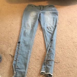 Baby blue denim jeans with chain detailing